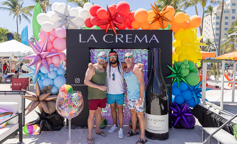 La Crema at Palm Spring Pride celebration with group of three men