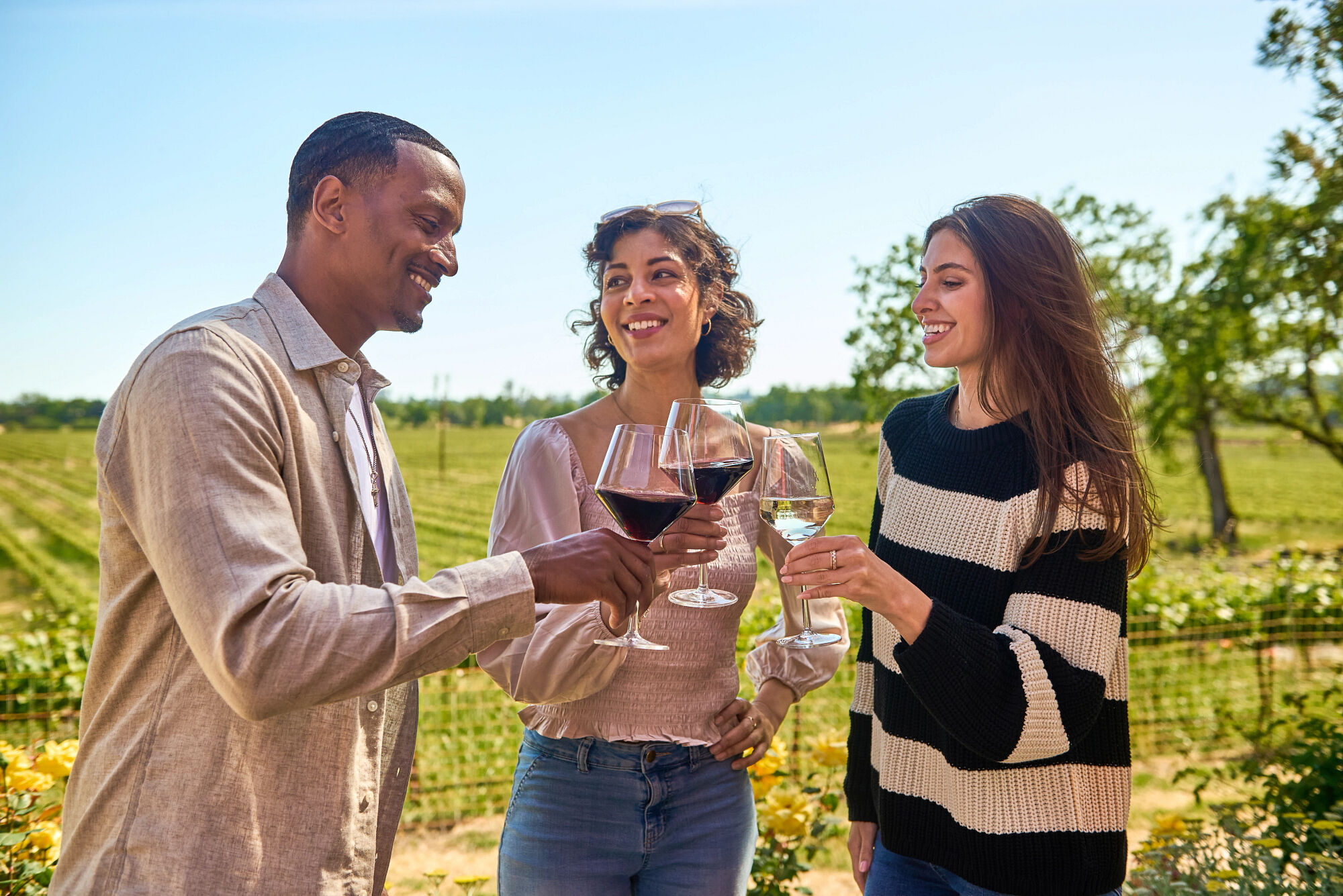 Three friends enjoying wine at the La Crema estate