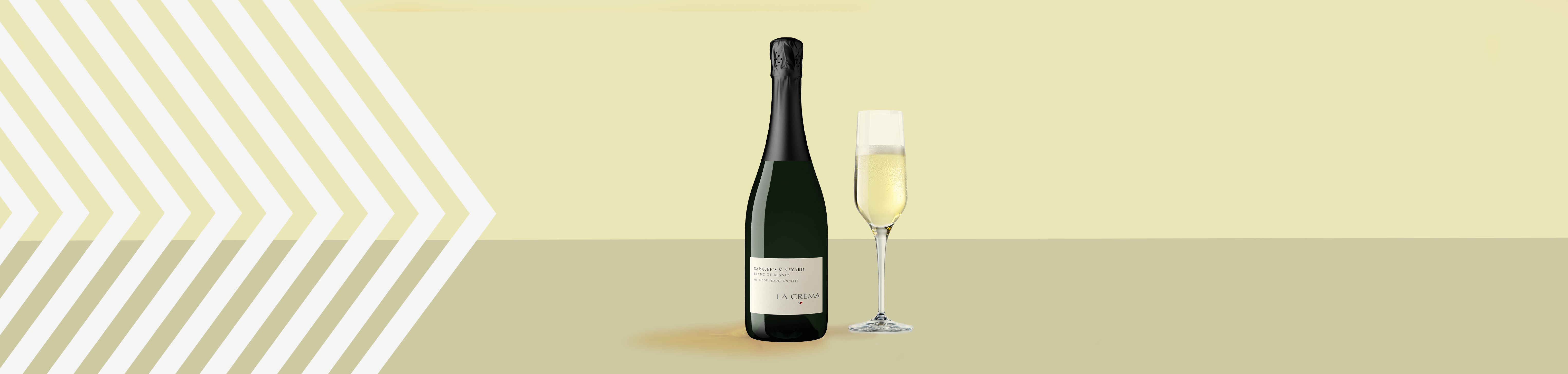 a bottle of La Crema Blanc de Blancs with a glass