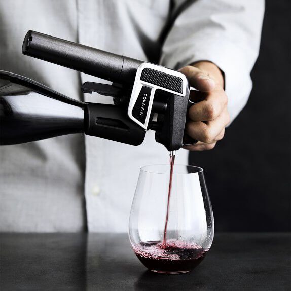 Coravin wine preservation system dispensing red wine
