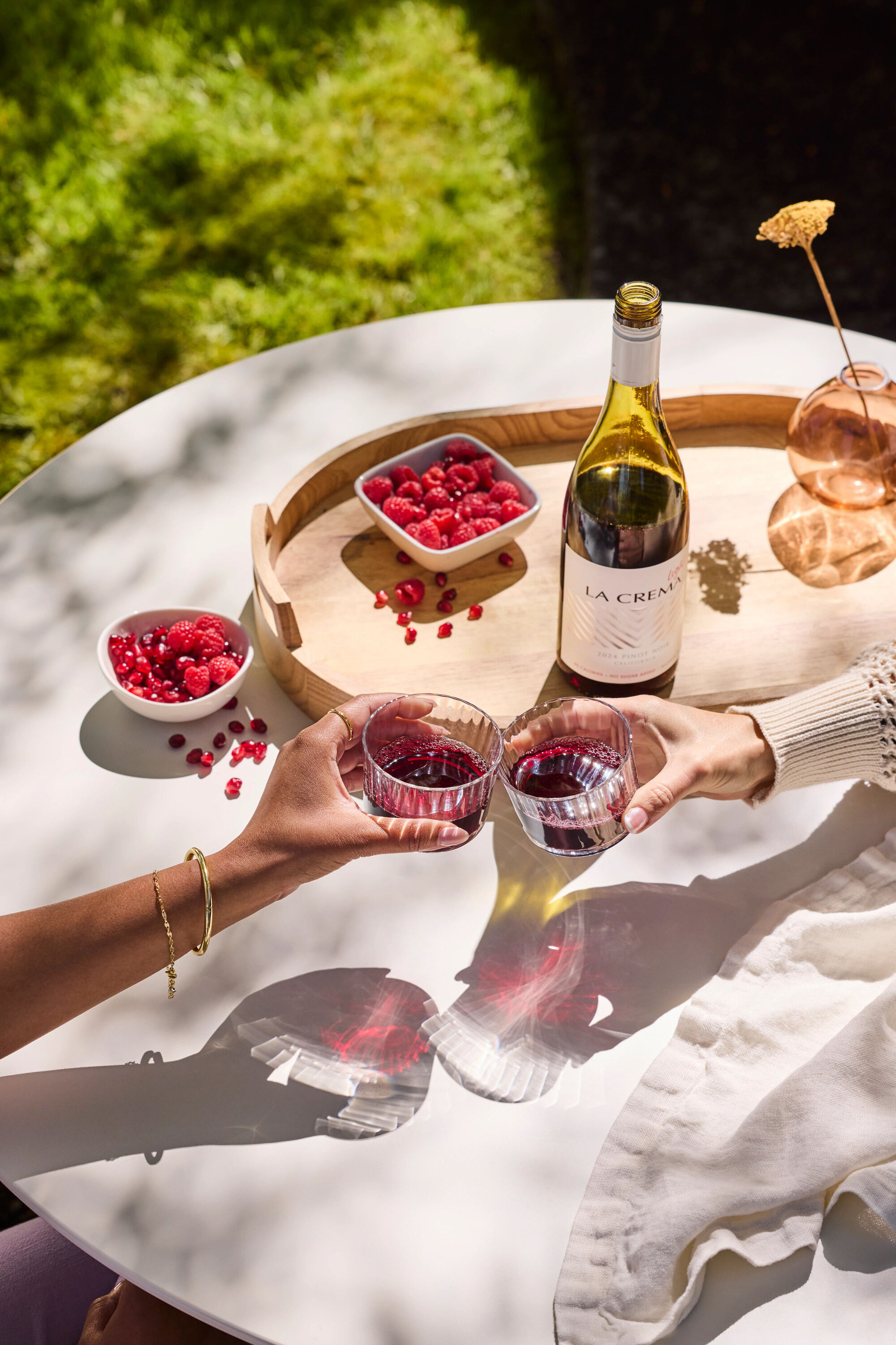 A group of friends enjoying La Crema Pinot Noir