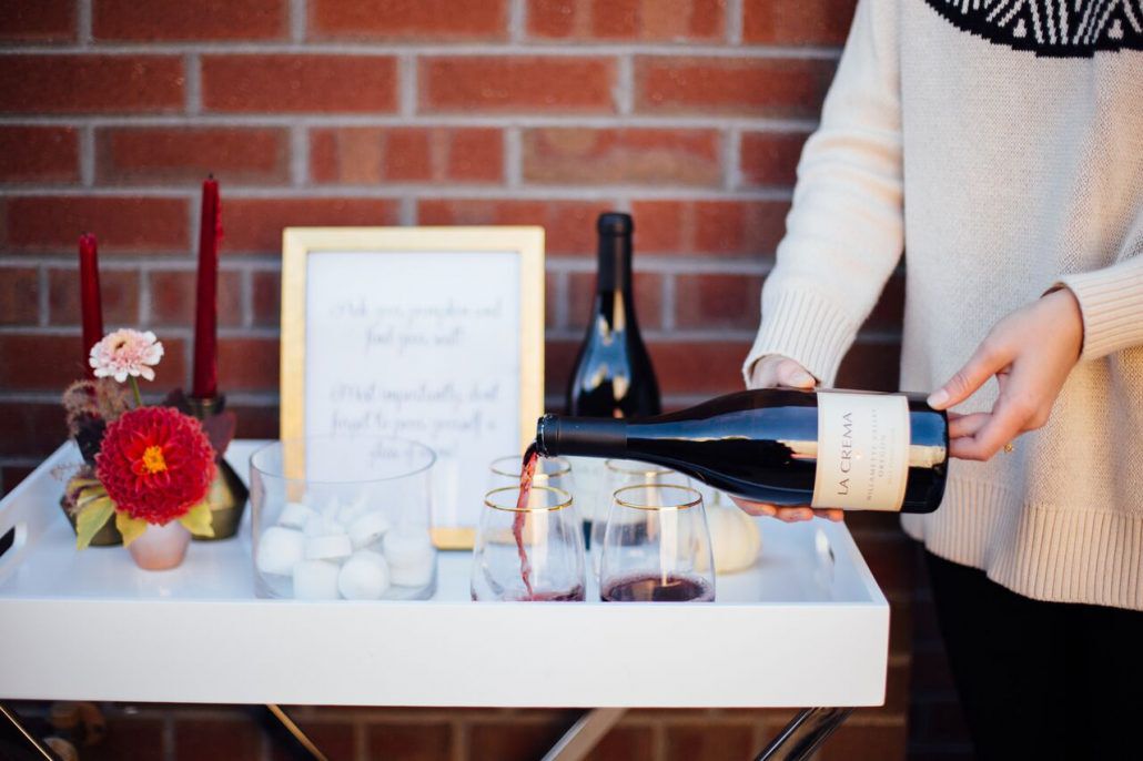 Pouring a bottle of La Crema Pinot Noir