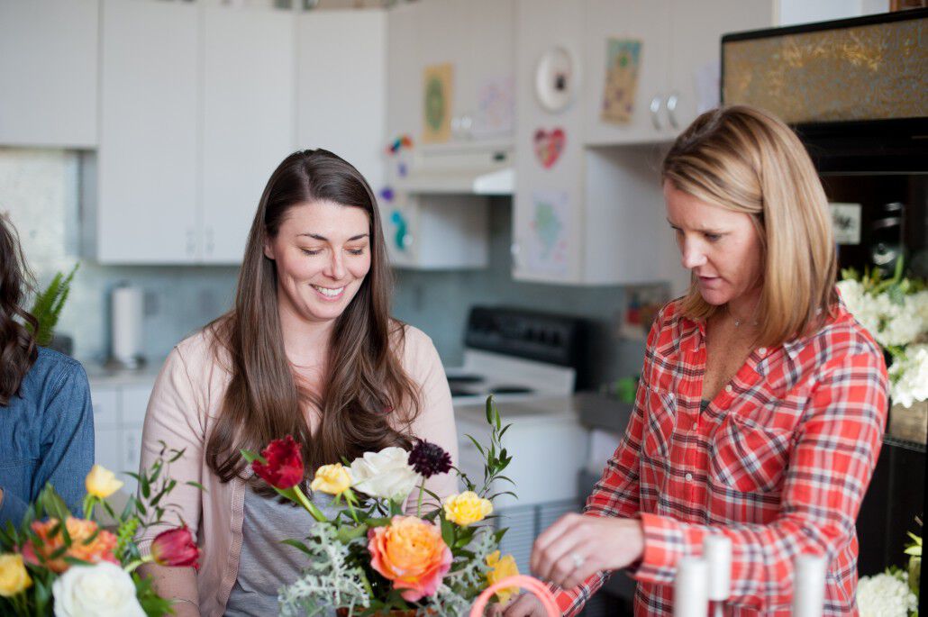 A person holding a bouquet of flowers