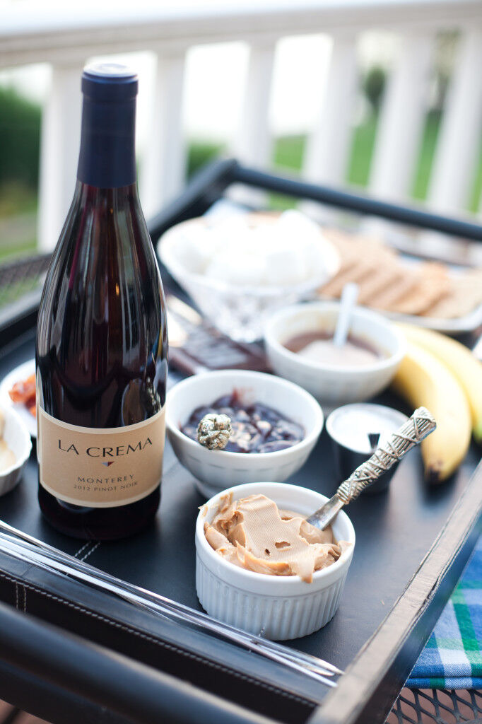 Friends sharing a bottle of La Crema Pinot Noir