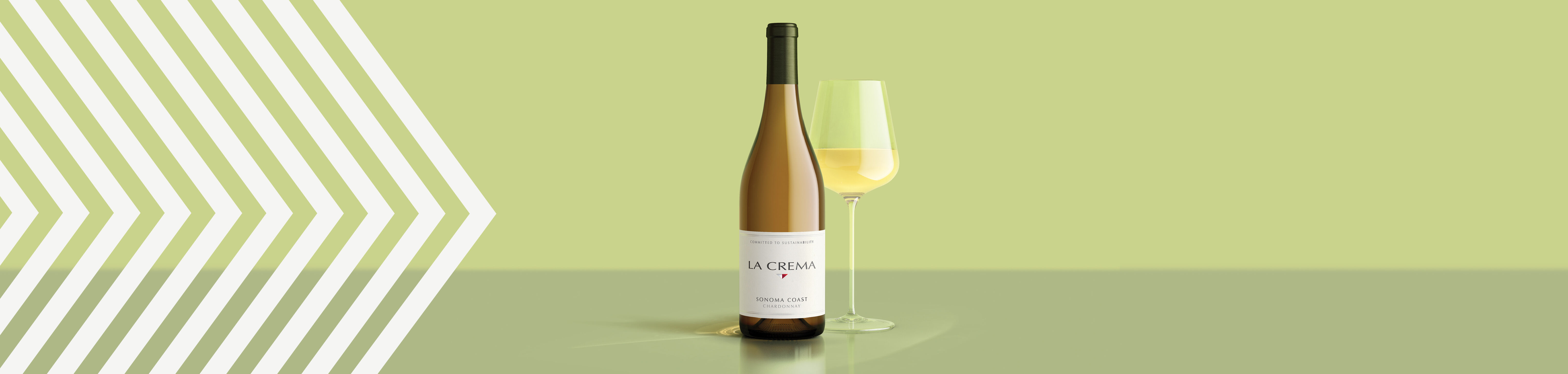 A bottle and glass of La Crema Chardonnay