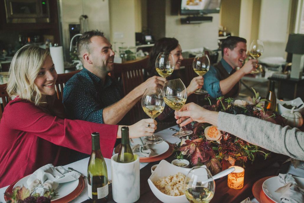 Cheers with friends at Friendsgiving