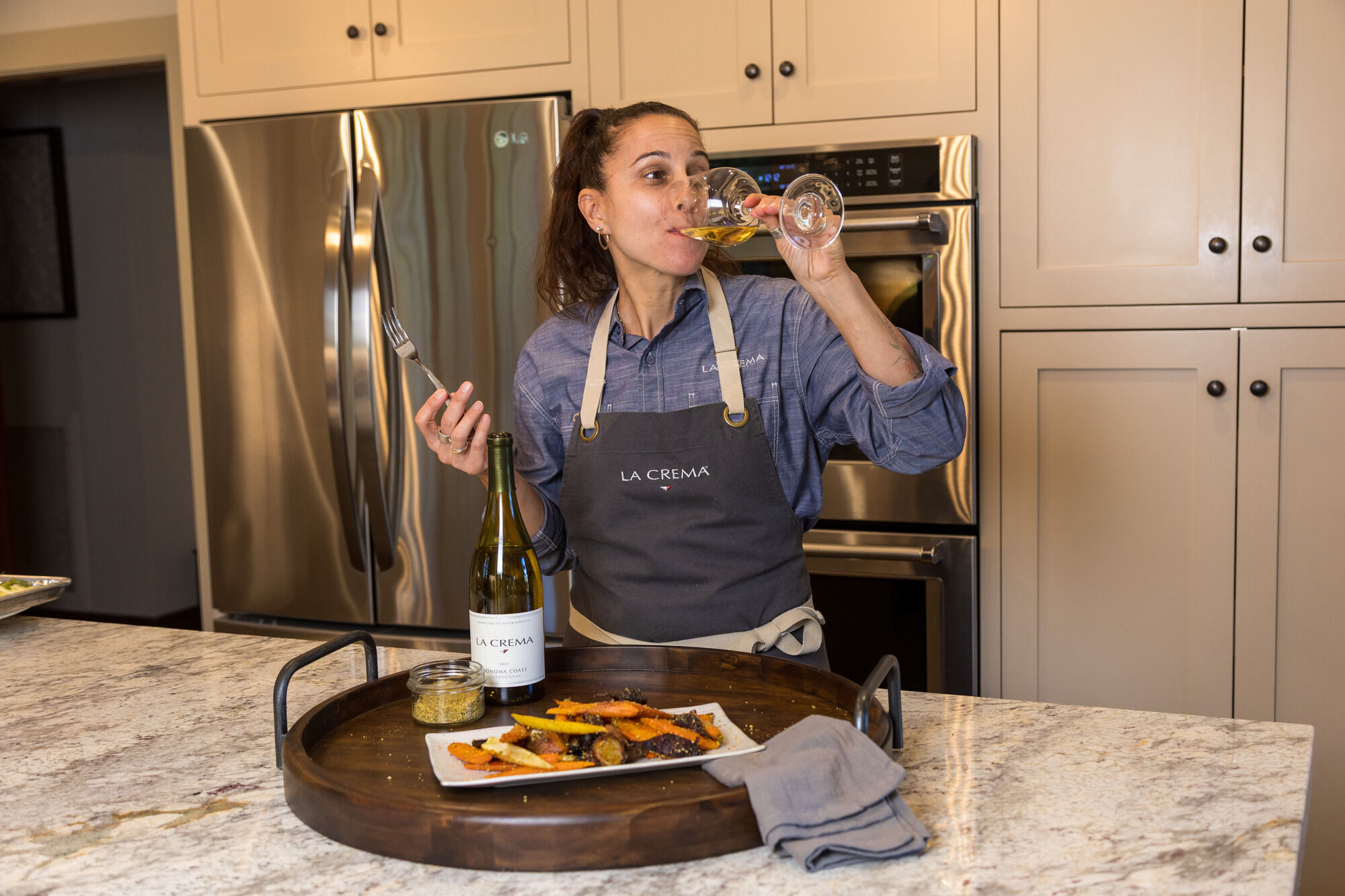 Tracey enjoying a glass of La Crema Chardonnay