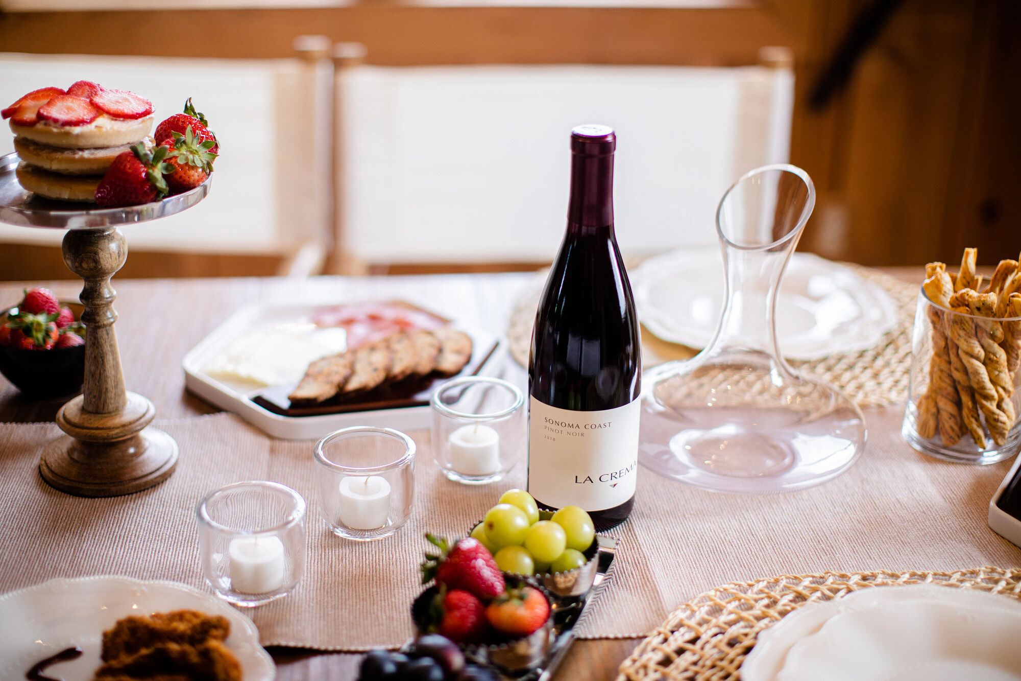 La Crema Sonoma Coast Pinot Noir with fruits and snacks