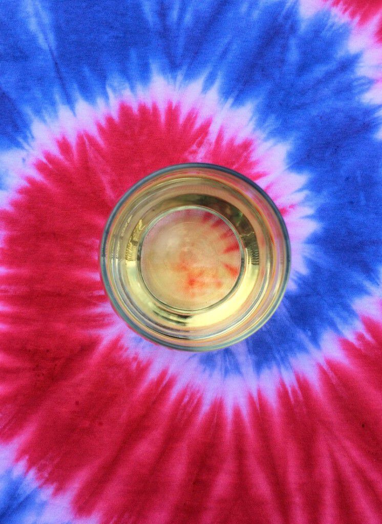 White wine with a tie dye shirt