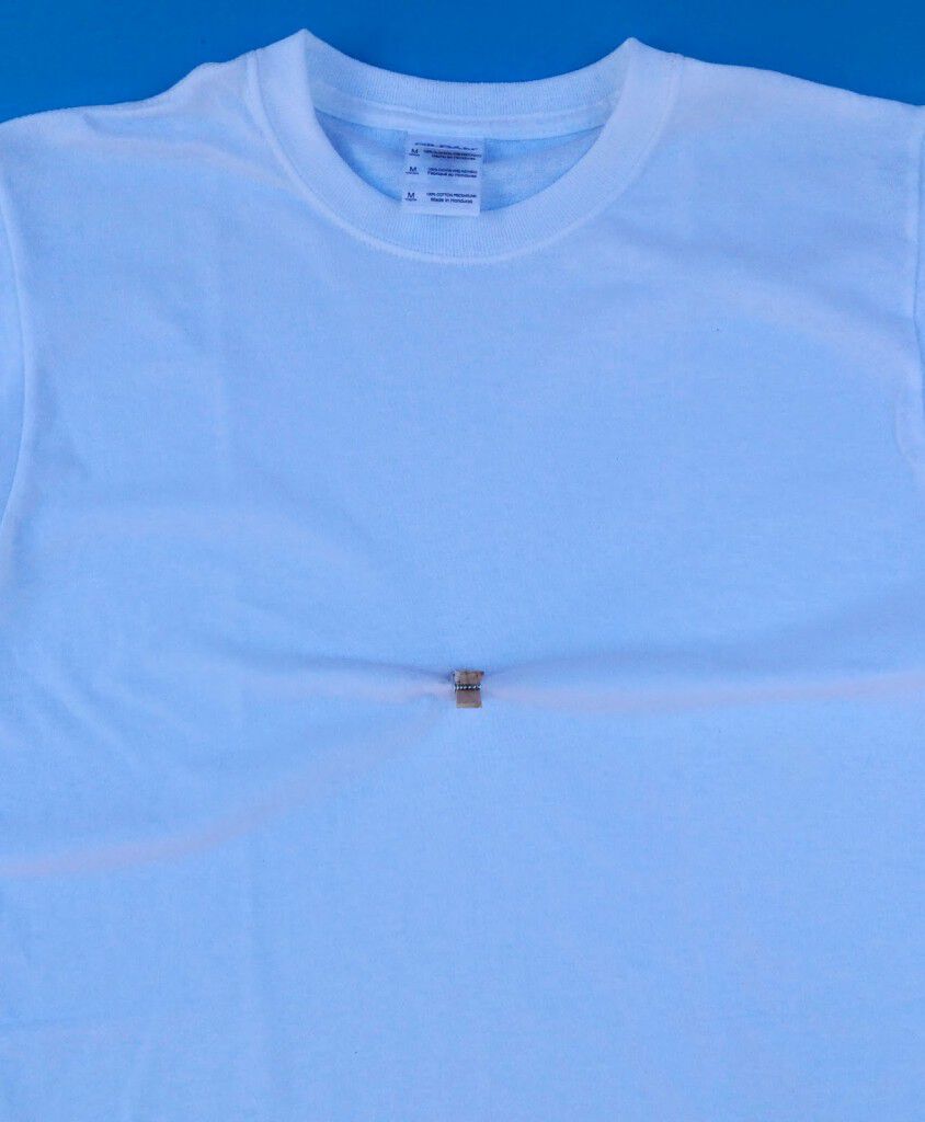 Shirt with a clothespin
