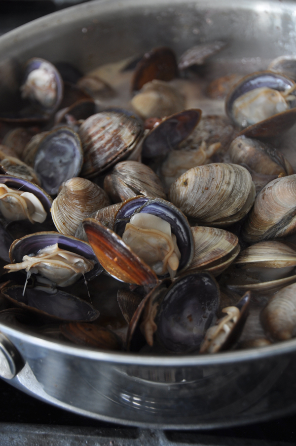After adding the clams, give them about 6 minutes to open up.