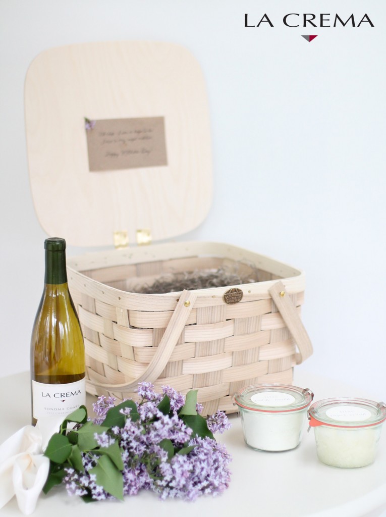 wine, lilacs, bath milk and a basket