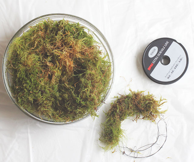 Tightly form the moss around your wreath form