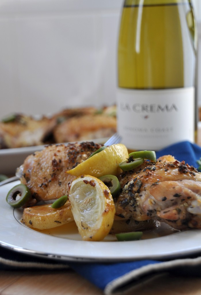 Chicken Thighs with Potato, Lemon & Castelvetrano Olives. Simple, rustic Mediterranean-inspired meal. Pair with La Crema Chardonnay.