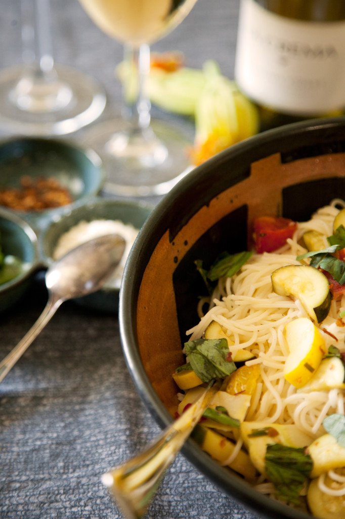 Serve immediately to retain the crunch of the squash, zucchini, and tomatoes. Rather than individually plate present family style for guests to serve themselves.