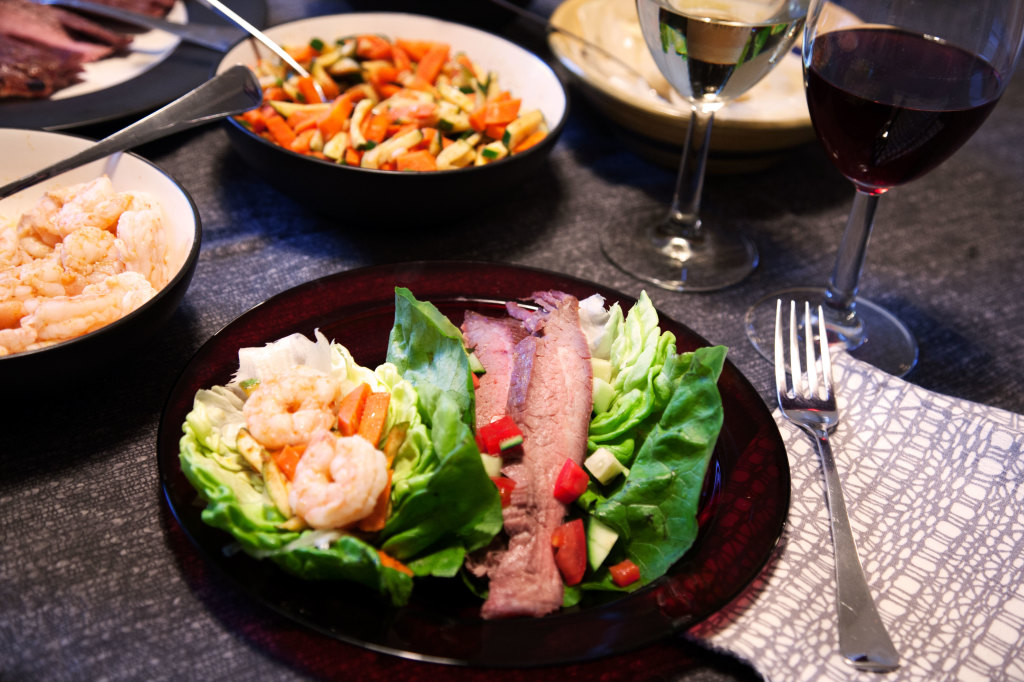 Guests customize their Thai Surf and Turf Tacos