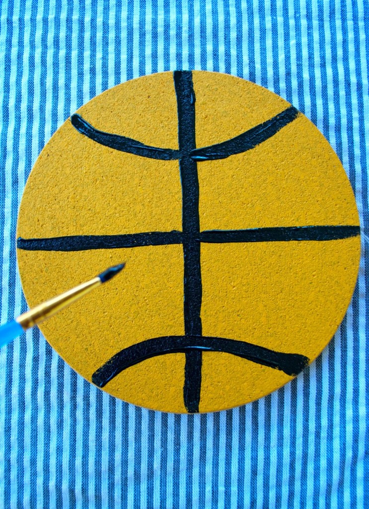 NCAA tournament party planning: Painted wine coaster DIY.