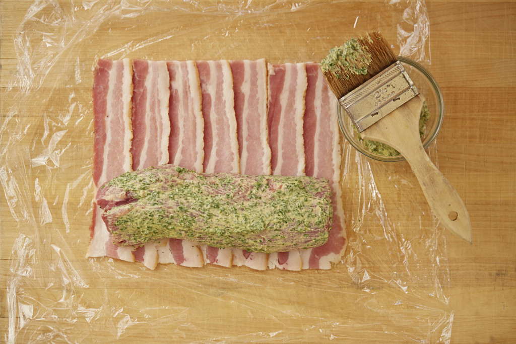 How to wrap bacon around a pork tenderloin.