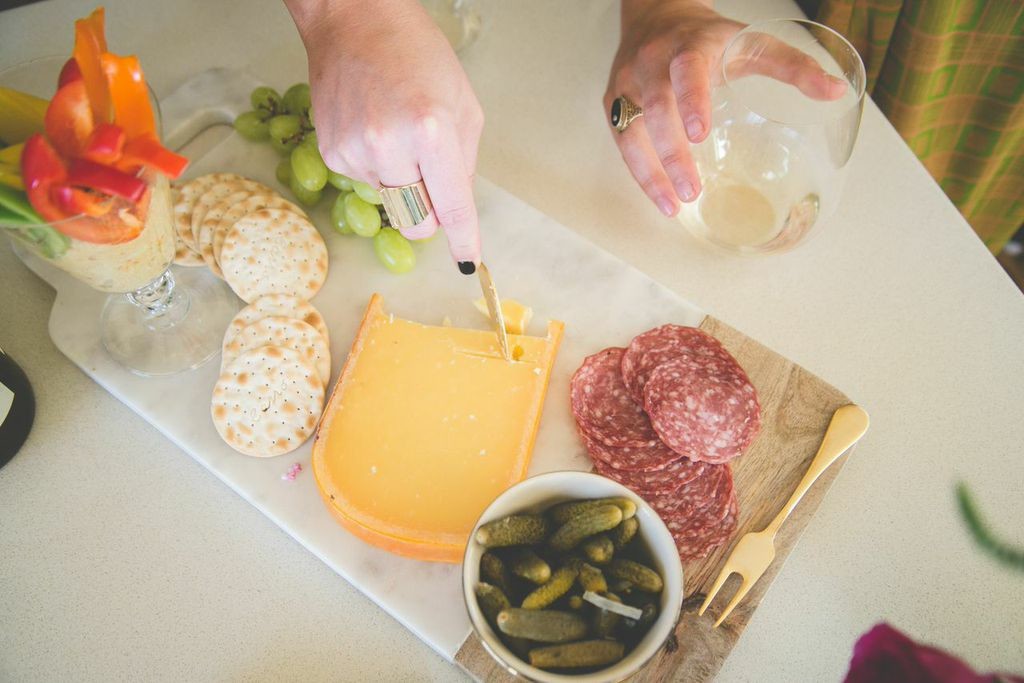 Happy Hour: Pair the wine you choose to drink with cheese and assortments.