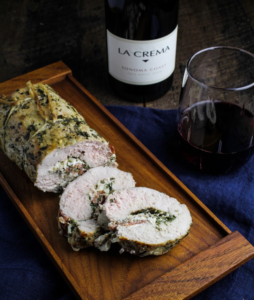 Prosciutto, Mozzarella & Sage Pesto Stuffed Pork Tenderloin: This stuffed and rolled pork tenderloin may not be strictly traditional, but it takes all of its inspiration from Italian cuisine. Butterflied and filled with layers of sage and rosemary pesto, fresh mozzarella cheese and prosciutto, then rolled up and roasted to juicy perfection. #recipe