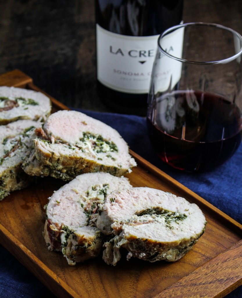 Prosciutto, Mozzarella & Sage Pesto Stuffed Pork Tenderloin: This stuffed and rolled pork tenderloin may not be strictly traditional, but it takes all of its inspiration from Italian cuisine. Butterflied and filled with layers of sage and rosemary pesto, fresh mozzarella cheese and prosciutto, then rolled up and roasted to juicy perfection. #recipe
