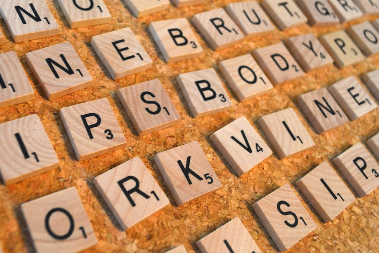 DIY Wine Words Coaster: Arrange your tiles to make sure all of your words are spelled out correctly.