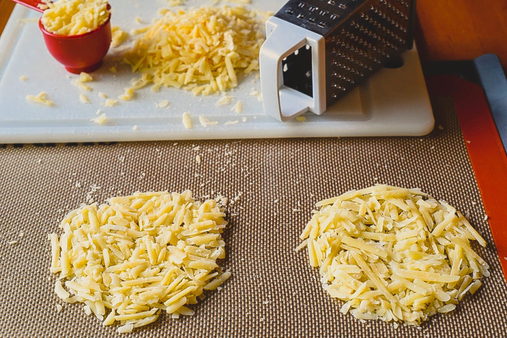 Crispy Parmesan Cups start with laying out the cheese on a Slipat Mat
