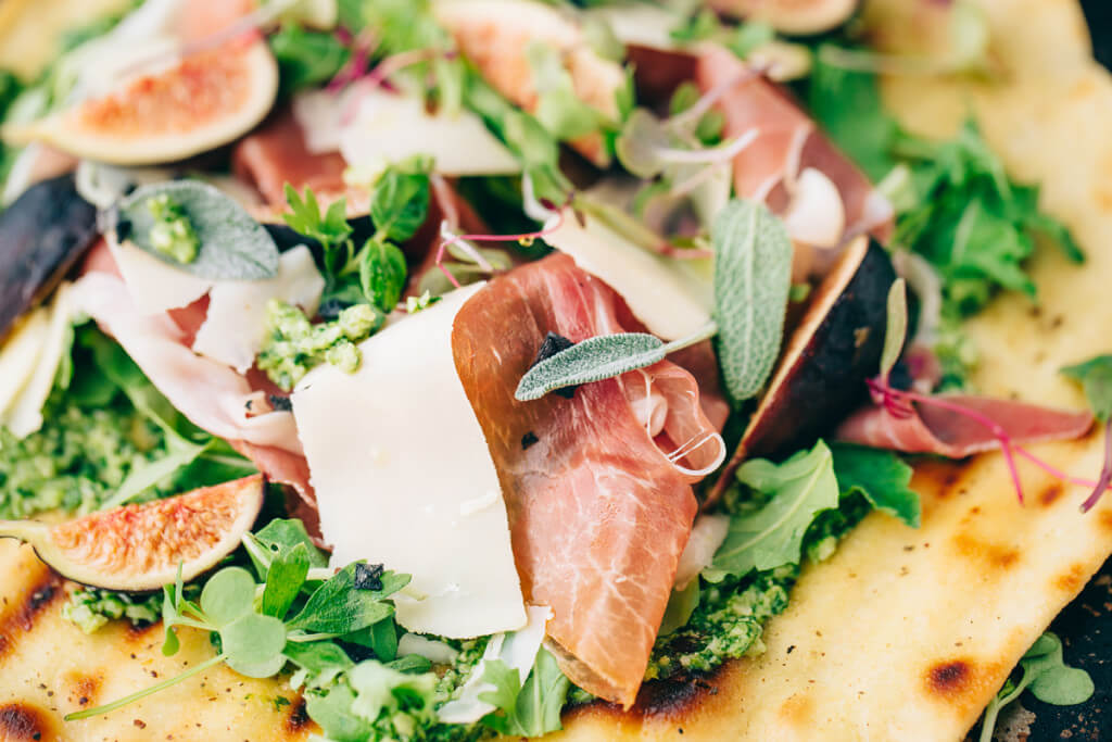 Sage & Arugula Pesto, Fig, and Prosciutto Flatbread