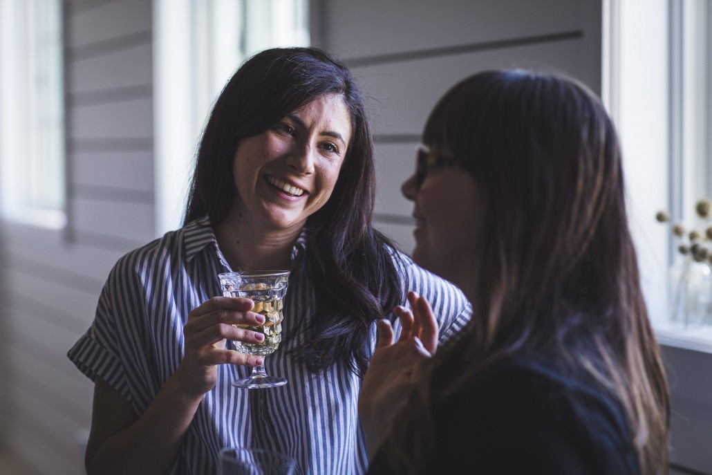 Kristan Raines of The Broken Bread and Megan Flynn Peterson of Freckled Italian enjoying La Crema Sonoma Coast Chardonnay