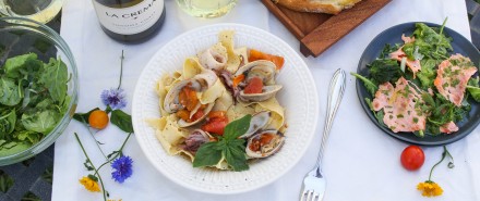 Italian Seafood Dinner: Seafood Pasta with Squid, Clams, and Tomatoes