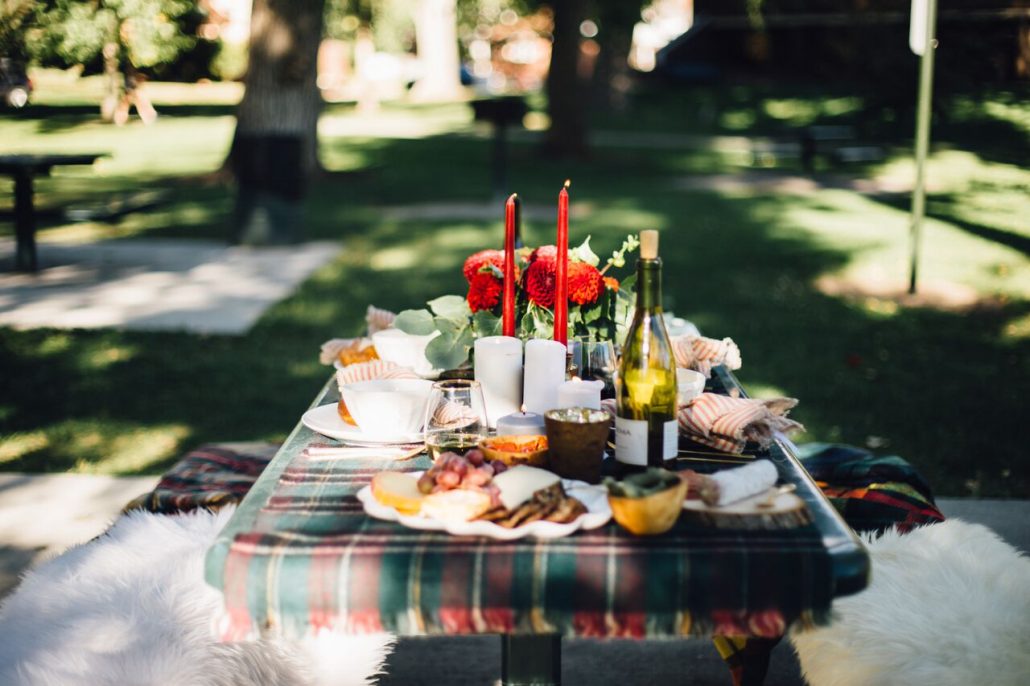 Beautiful plaid tablescape for a fall al fresco dinner party