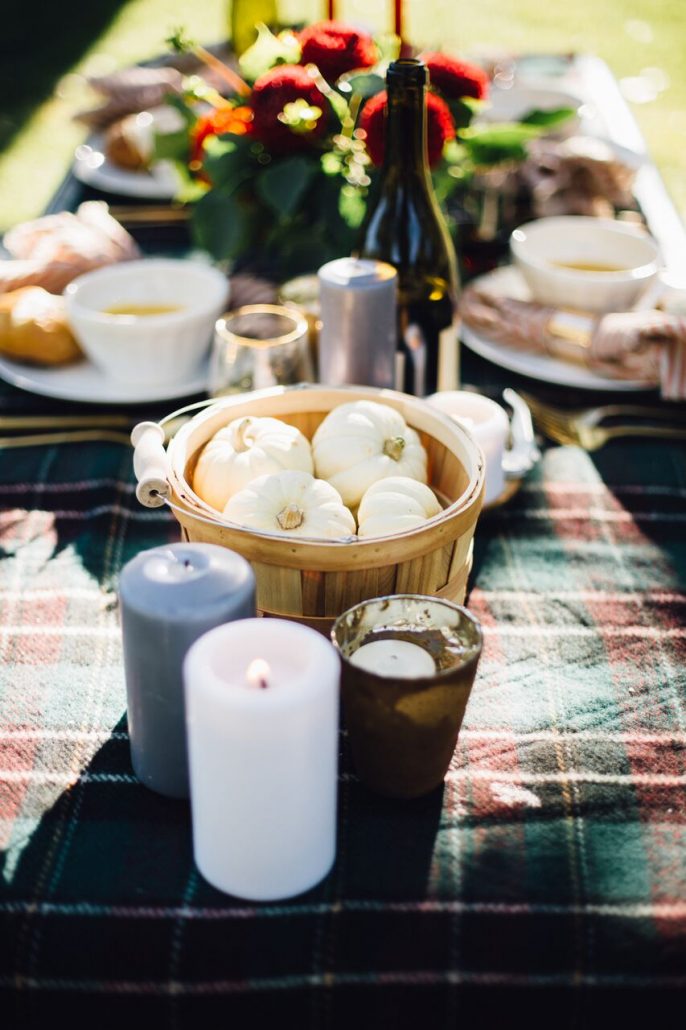 A plaid tablecloth and some gourds are essential to a Fall Al Fresco Dinner Party 