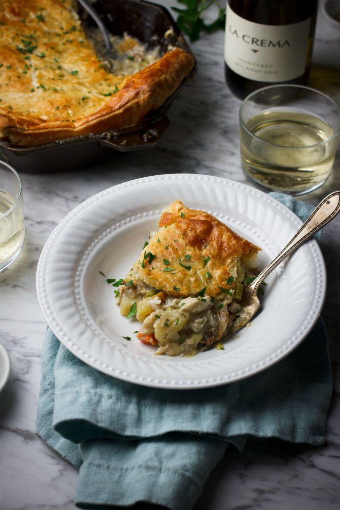 Cut and slice the chicken pot pie and serve on a plate or in a pasta dish