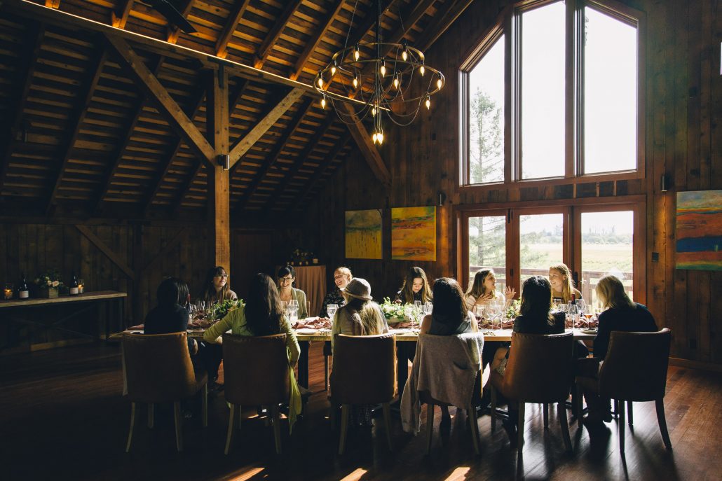 A tablescape with a backdrop of vineyard views at the La Crema Estate at Saralee's Vineyard