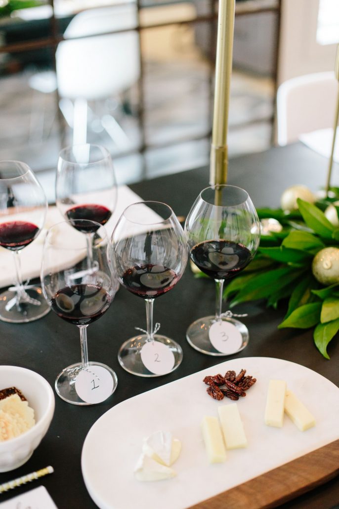 Cheese and accoutrements alongside the wines for a blind wine tasting