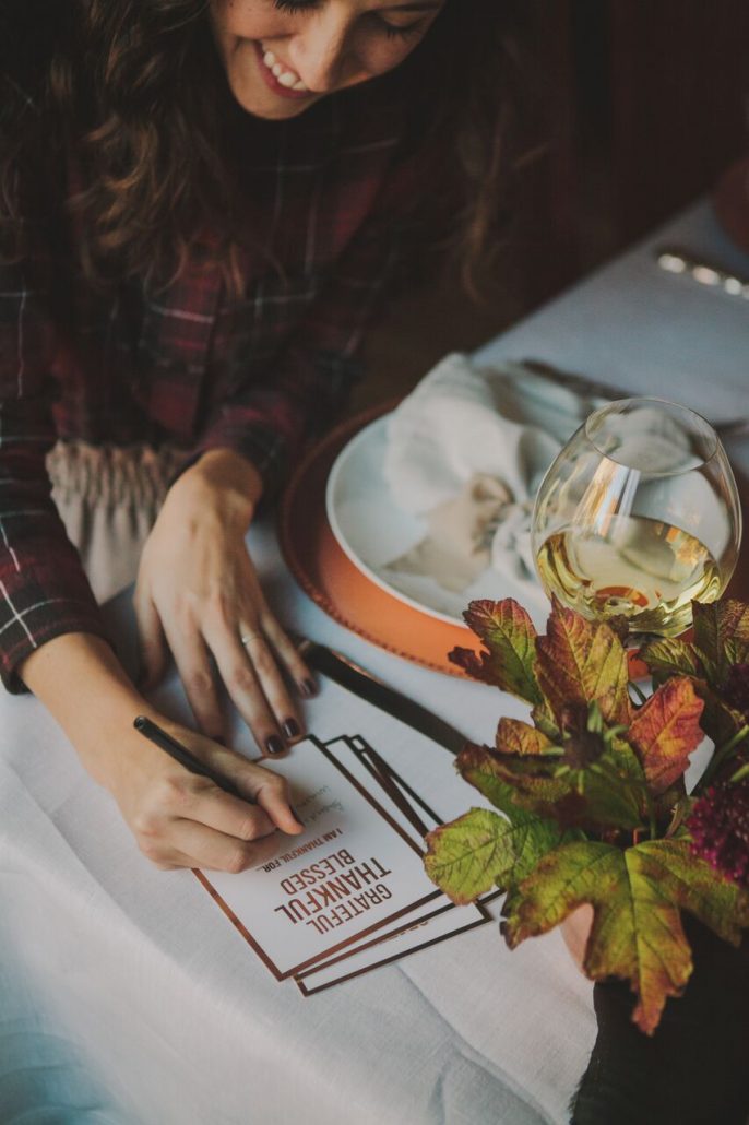 Include cards where guests can write down what they're thankful for at your Friendsgiving