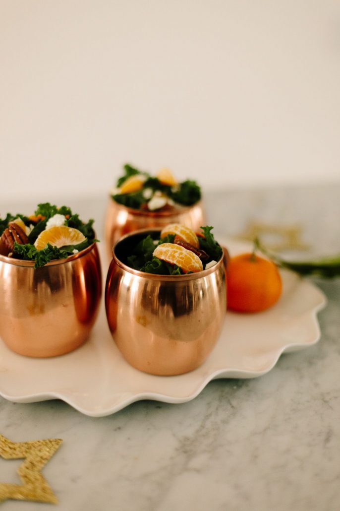 Kale, Clementine and Goat Cheese Salad festively served in Moscow Mule mugs for a New Year's Day Brunch