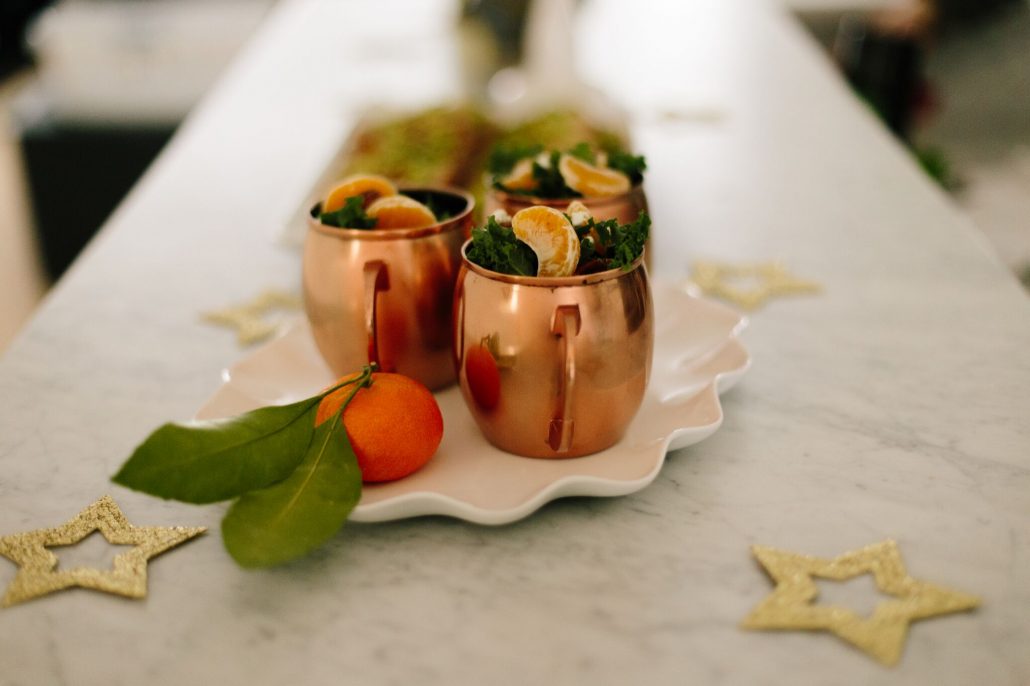 Kale, Clementine and Goat Cheese Salad festively served in Moscow Mule mugs for a New Year's Day Brunch