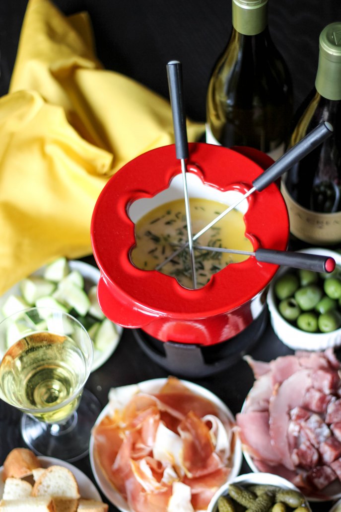 Havarti Cheese Fondue with charcuterie, veggies and olives.
