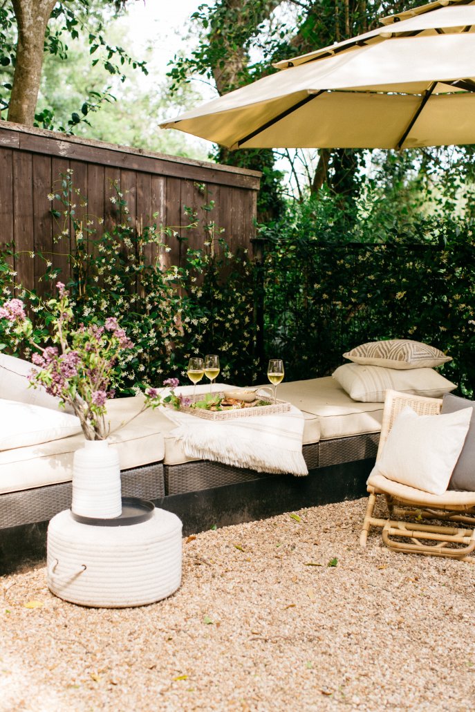 Cozy area for conversation at a low-key dinner party by Camille Styles